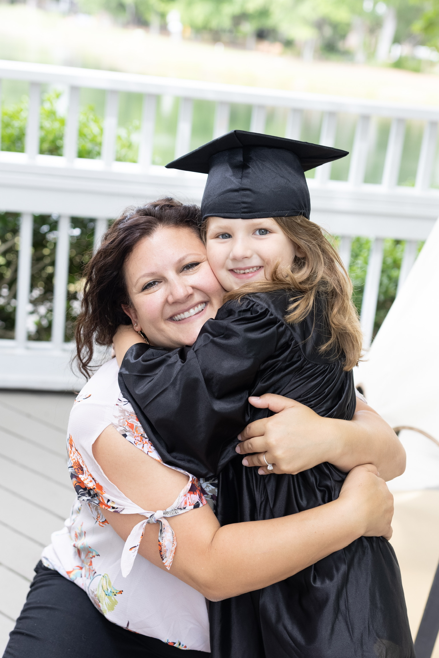 Heather Calhoun celebrating graduation day with her daughter at Ivybrook Academy Mount Pleasant.